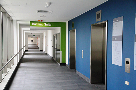 Level 3 corridor with sign reading Birthing suite